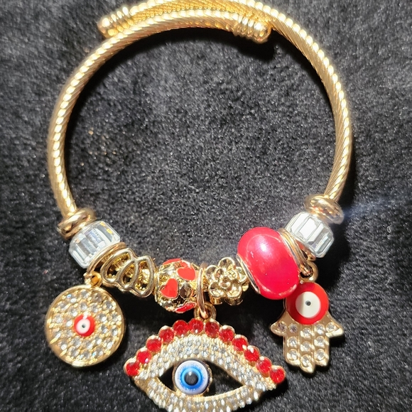 GOLD STAINLESS STEEL TWIST CHARM BRACELET - Picture 5 of 5